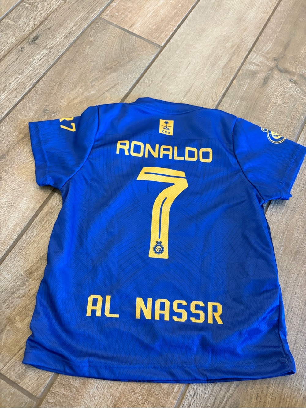 Al Nassr away jersey featuring Cristiano Ronaldo's kids size 4